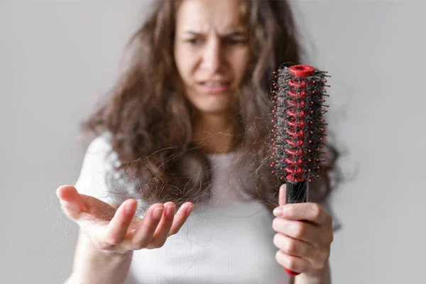 Understanding Hair Fall - Causes, Symptoms, and Treatment Options